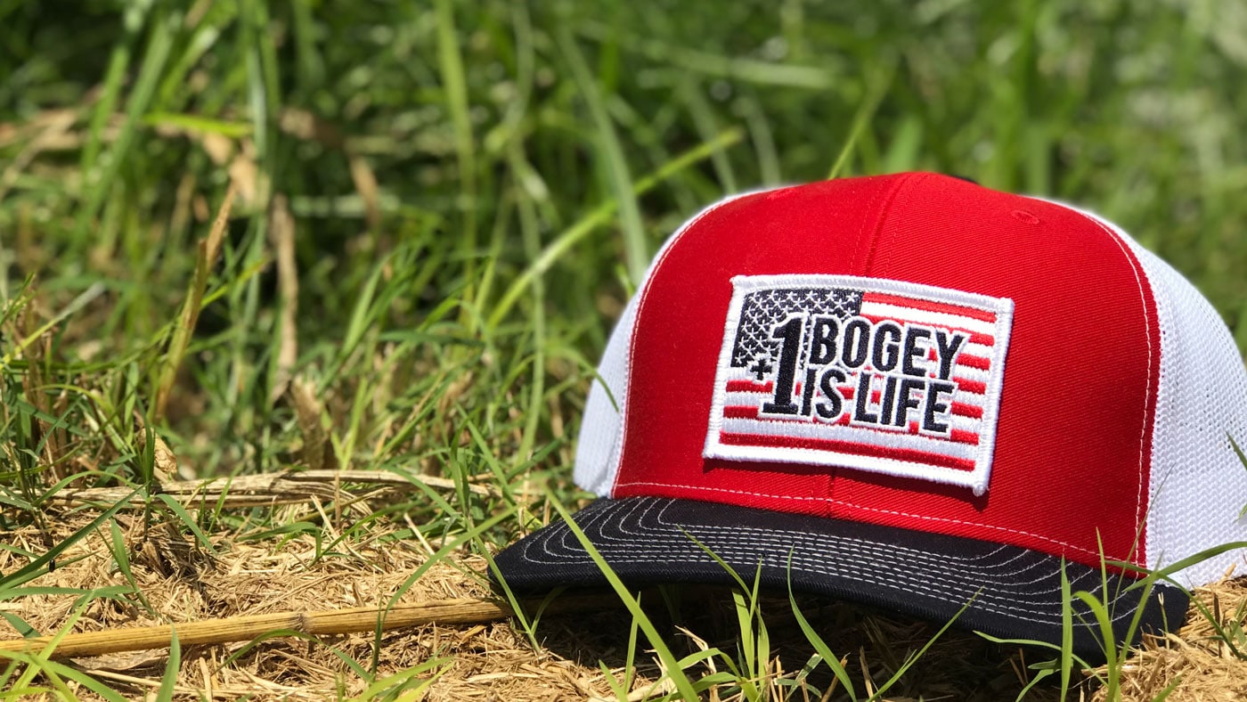 American flag color patch hat on the grass 