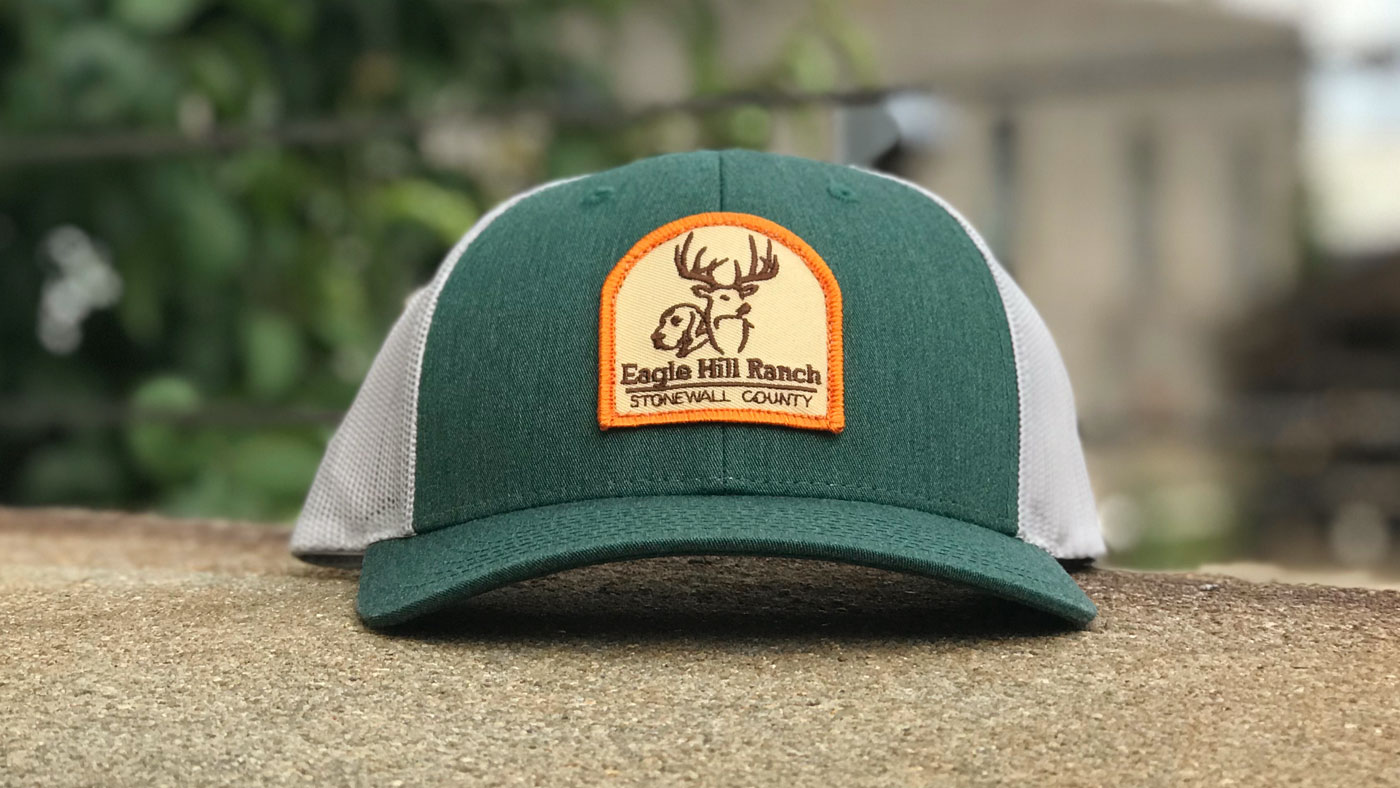 Arched ranch patch on forest green Richardson 115 trucker 