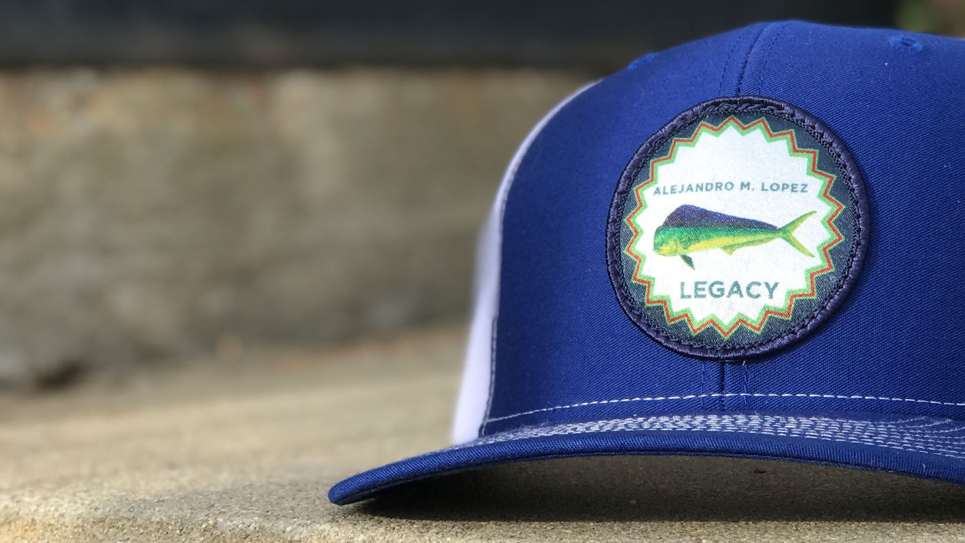 Mahi Mahi custom logo design on royal blue cap