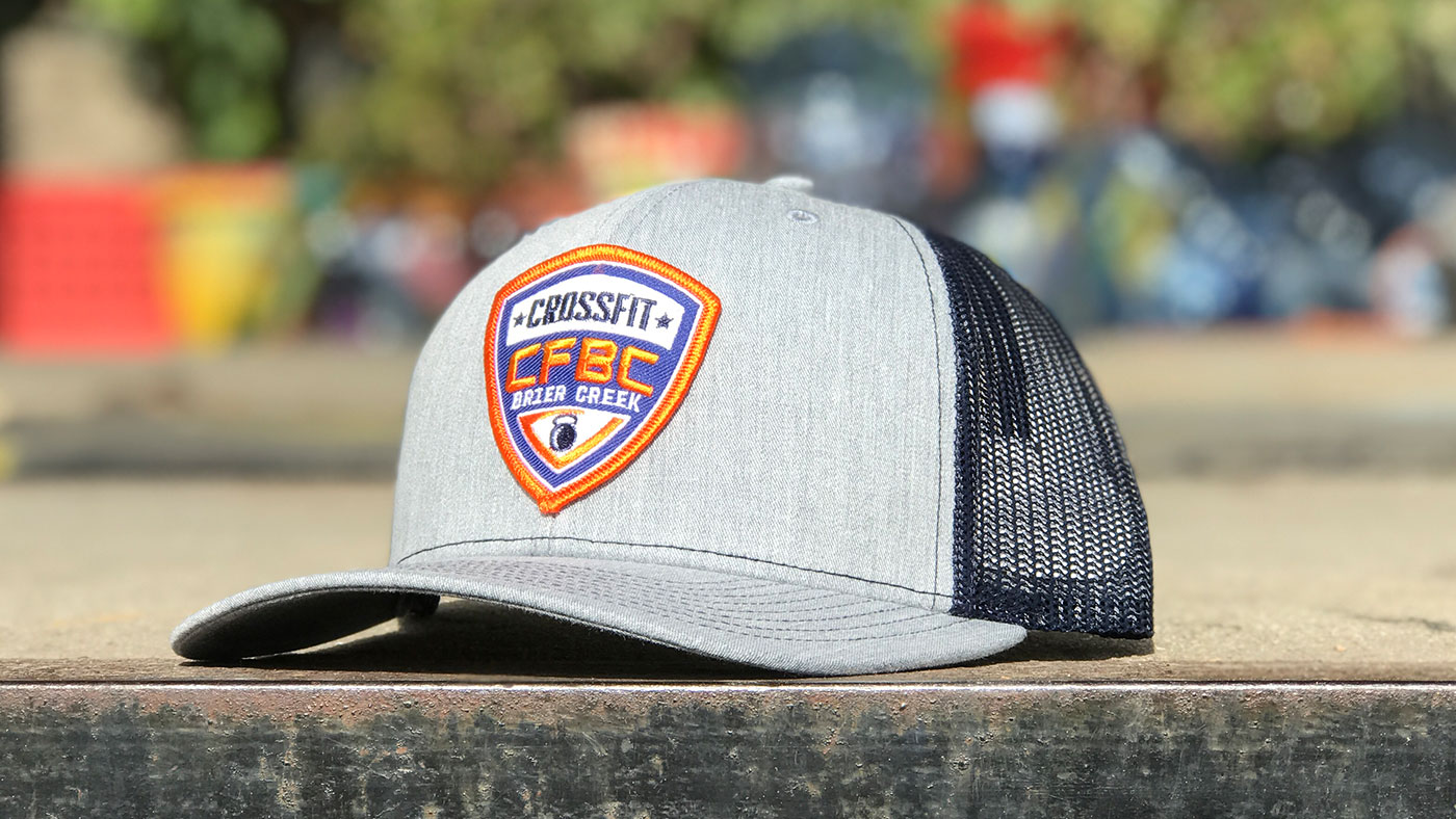 Badge shaped logo on custom hat