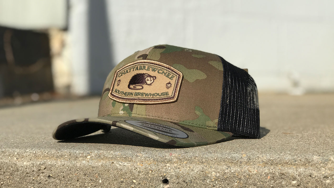Multicam hunting cap with possum patch design