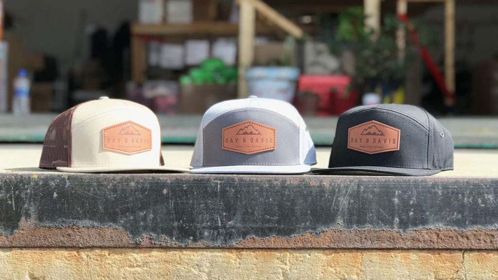 Multiple colorway 7 panel caps with leather patches