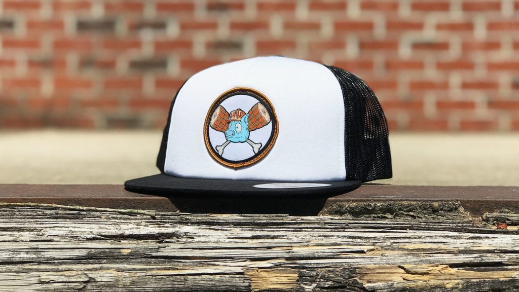 custom restaurant trucker hat on the patio 