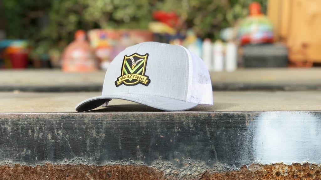 Custom hat with patch at a park 