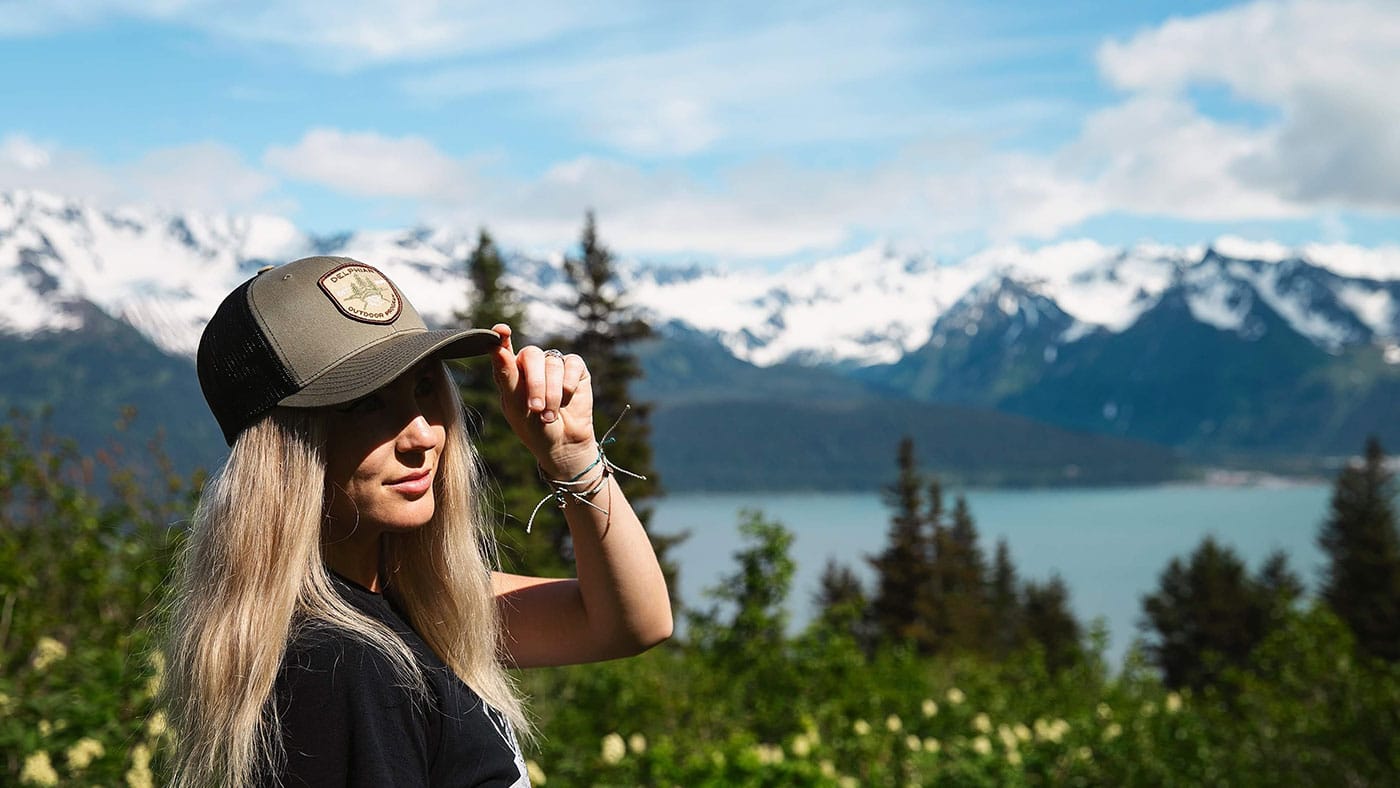 Outdoorsy woman wearing custom hat at a national park 