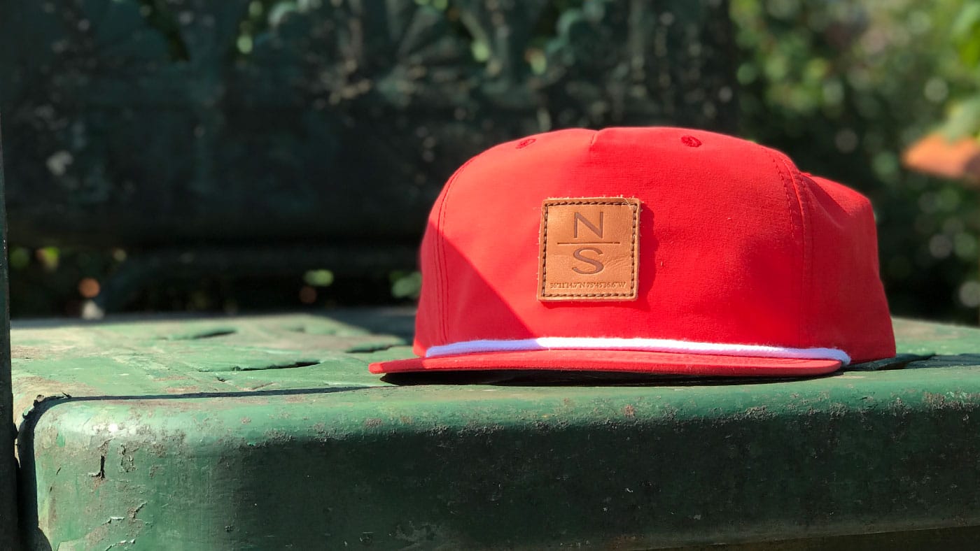 small square leather patch on classic rope cap