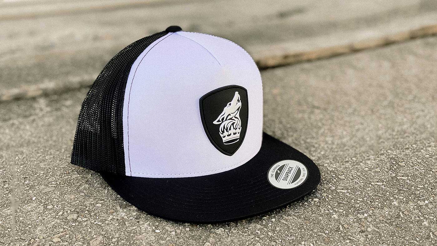 B&W high crown adjustable cap on sidewalk