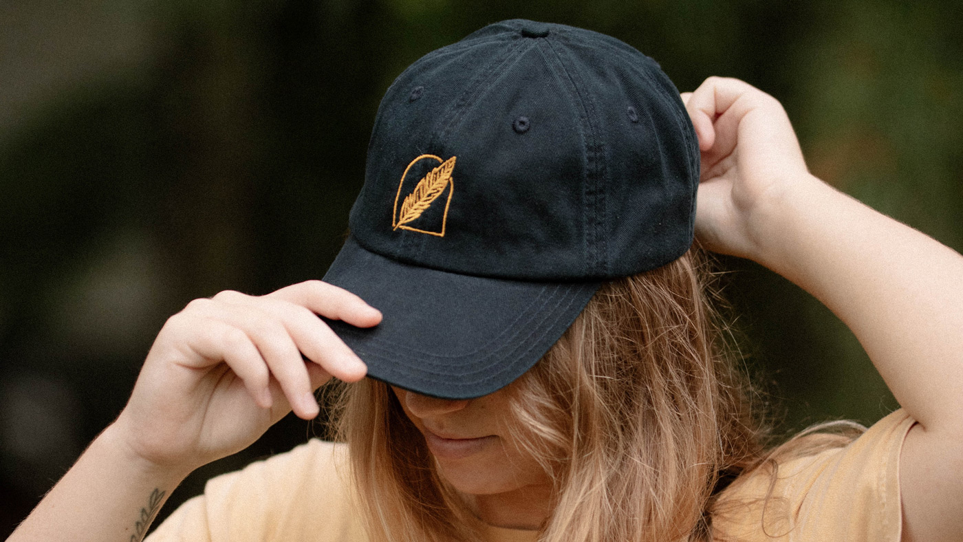 Outdoorsy lady wearing an embroidered dad hat