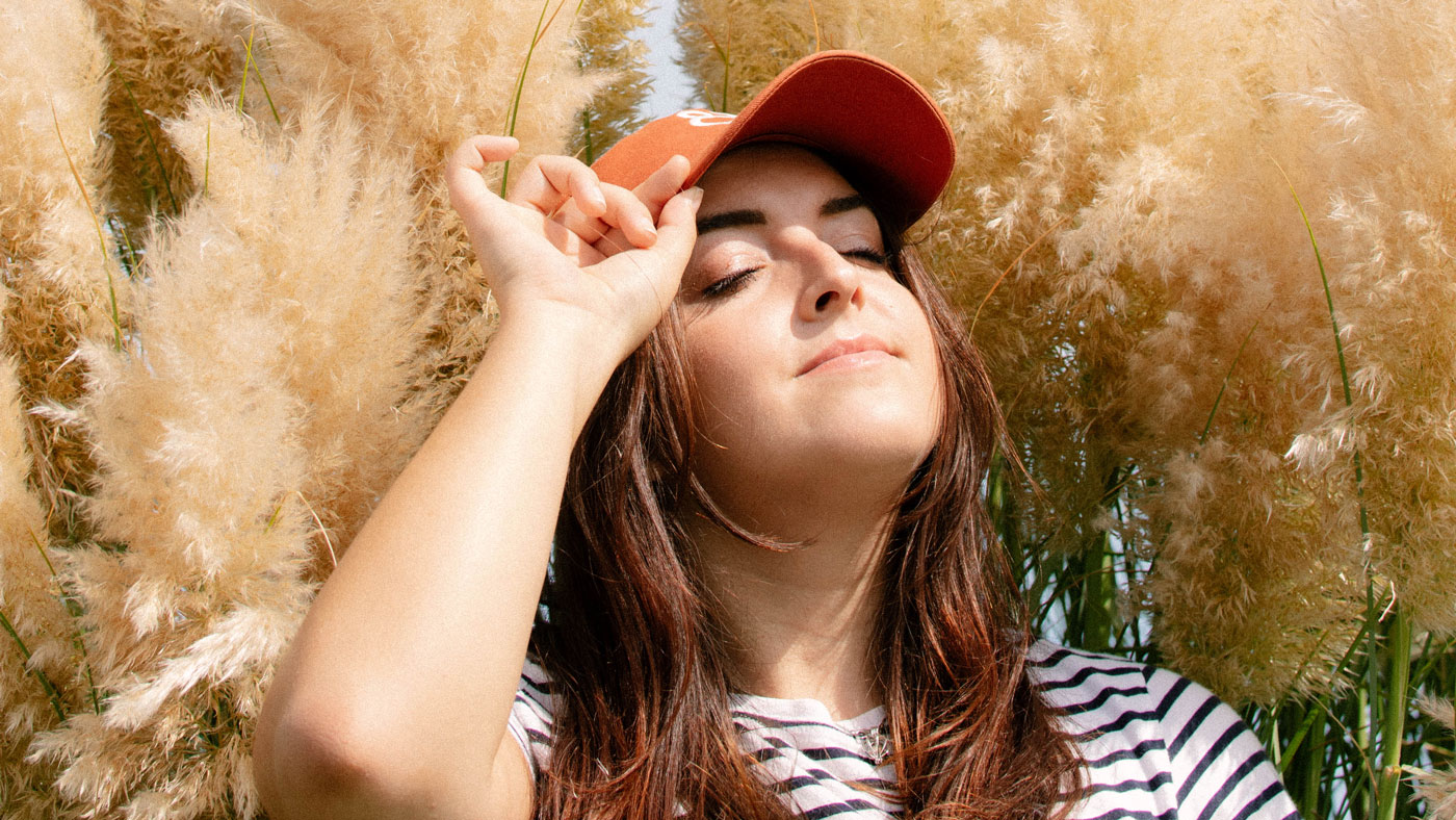 girl wearing custom embroidered hat