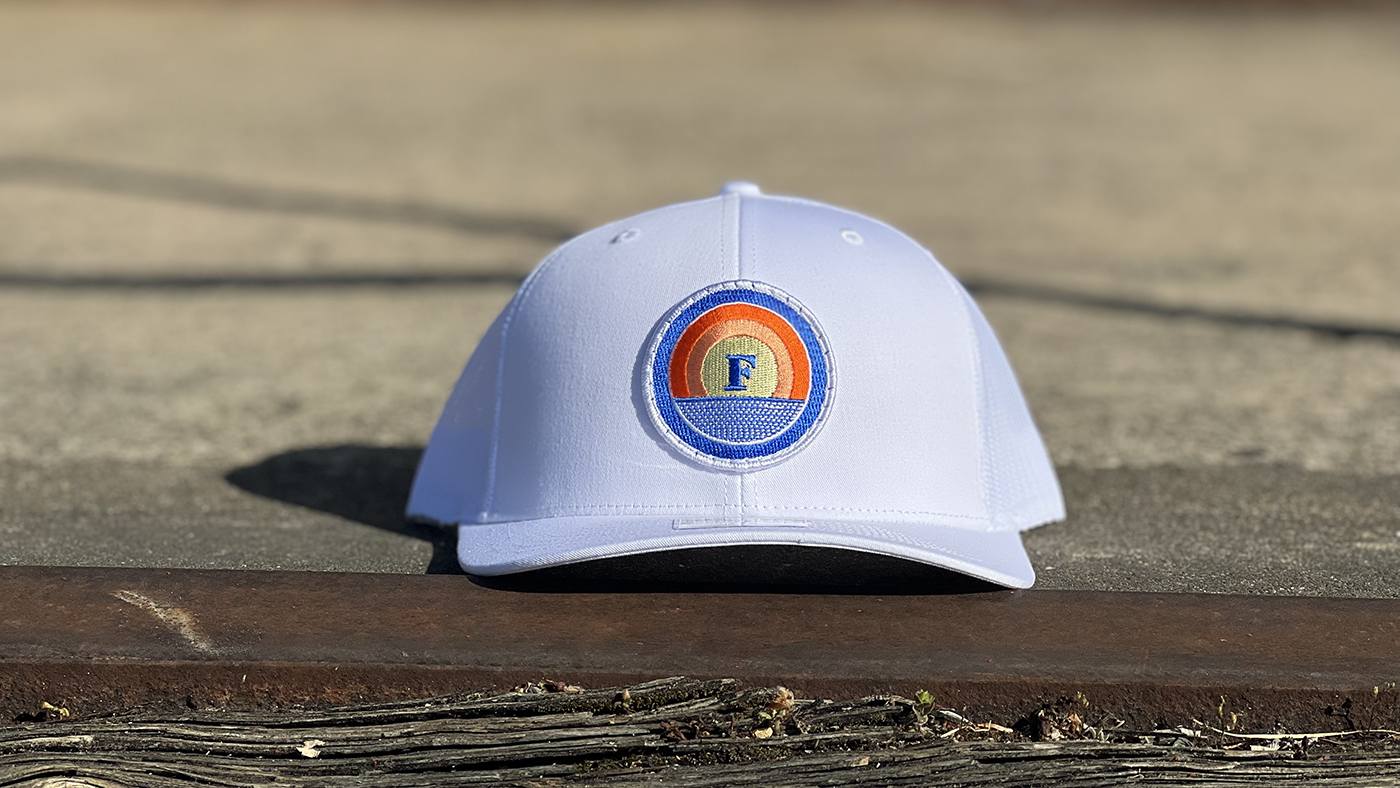 white golf hat with color patch outside
