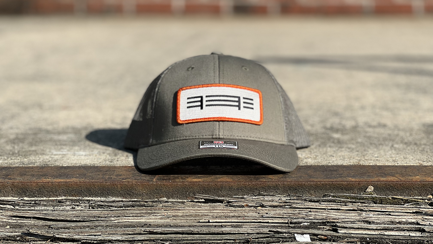 minimalist cap design on Richardson trucker