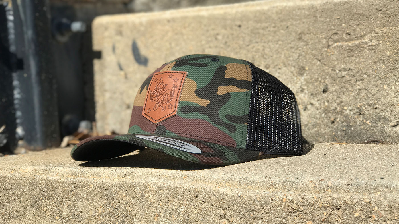 Yupoong 6606 - Camo Leather Patch Hat