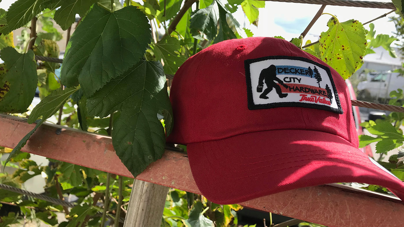 Custom Dad Hat Red Sasquatch cap at a farm