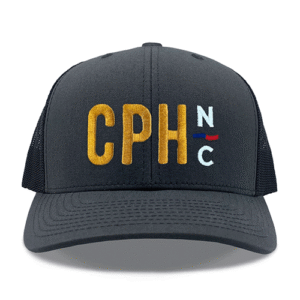 Yupoong 6606 charcoal and black trucker hat with CPH logo in gold and white direct embroidery