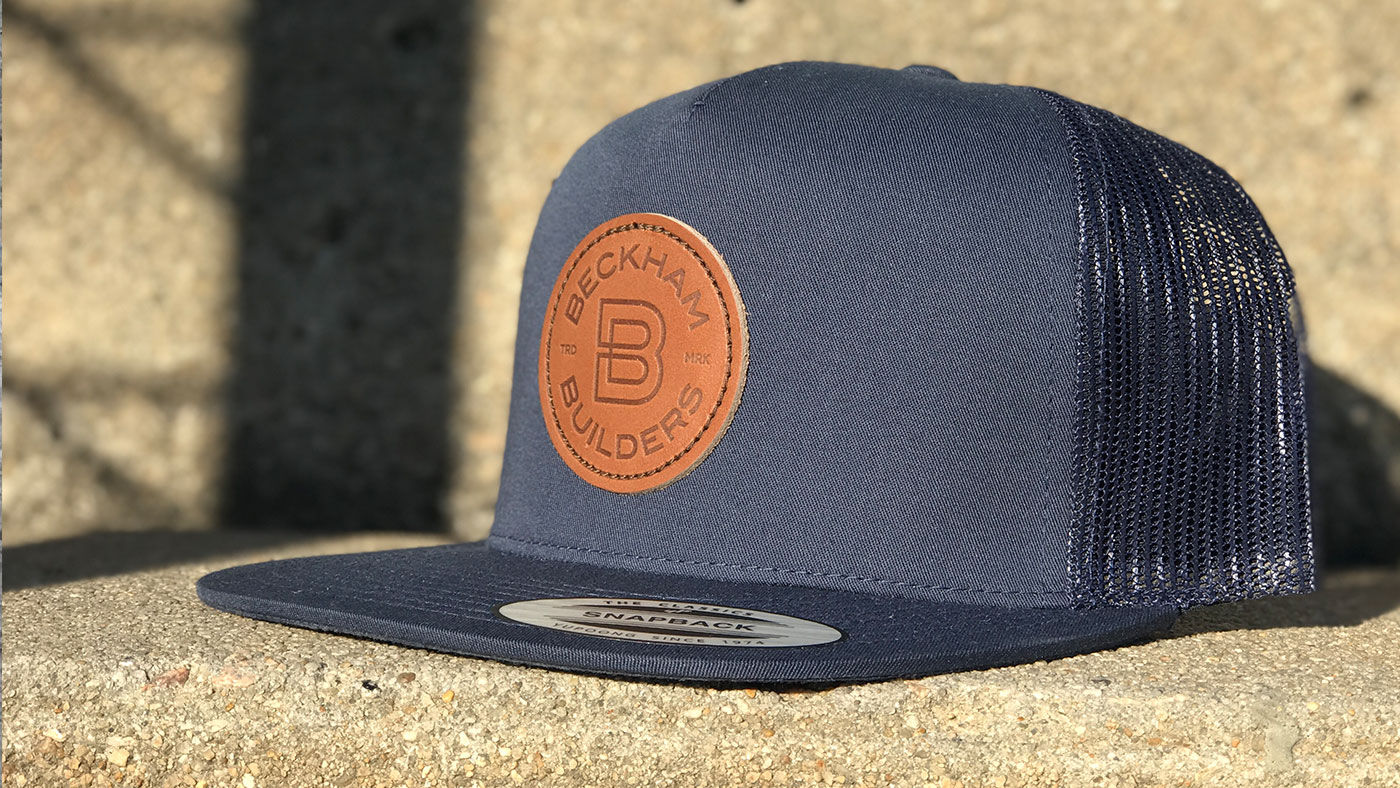 Yupoong 6006 - Custom Leather Patch Trucker Hat