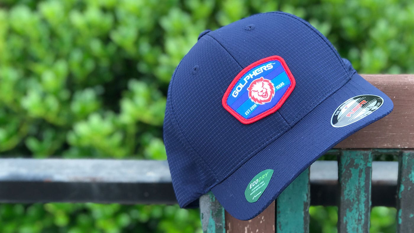 Custom Performance Golf Hats Customized performance Flexfit on a bench
