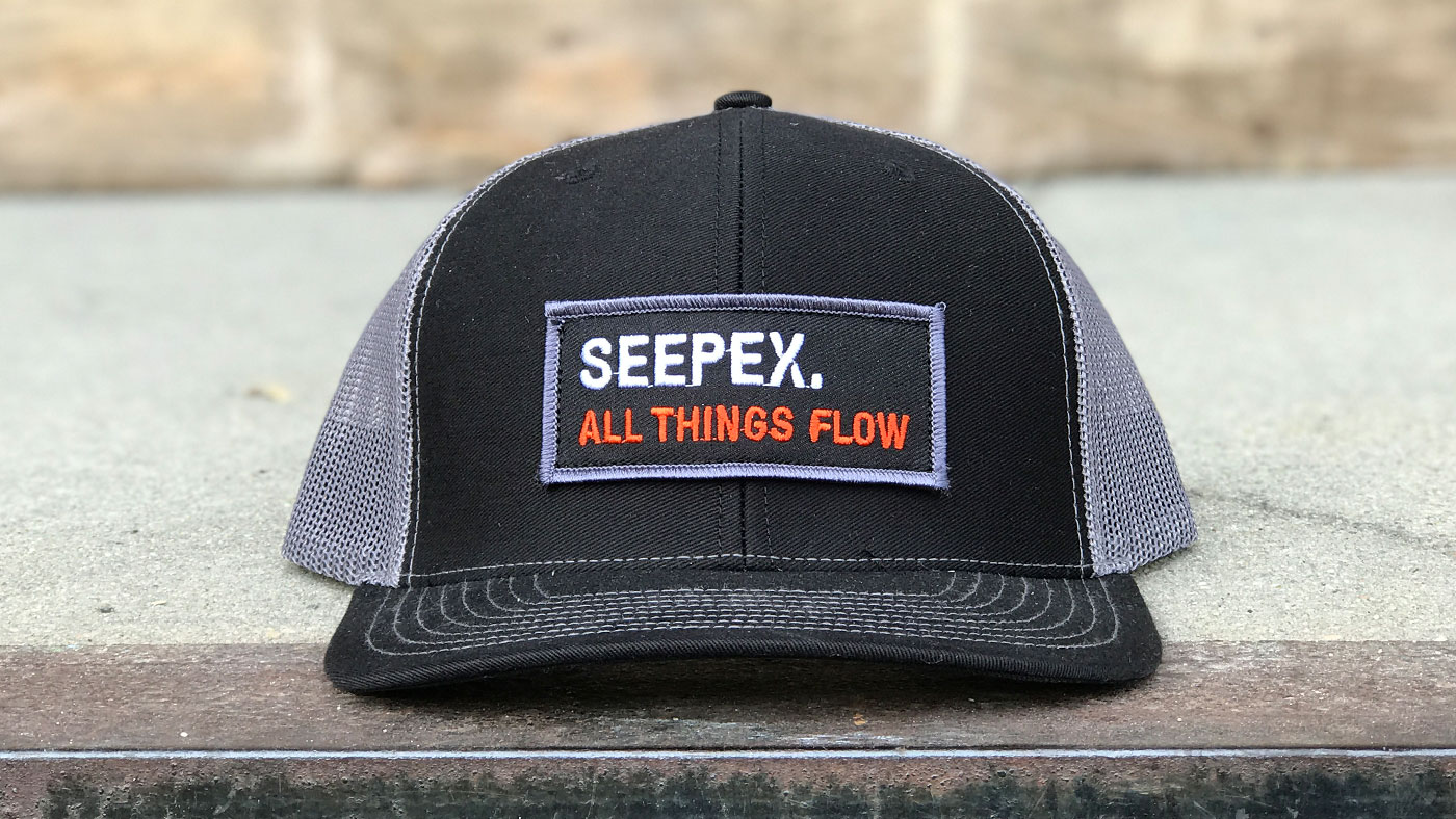 black and grey trucker with customized text embroidered patch 