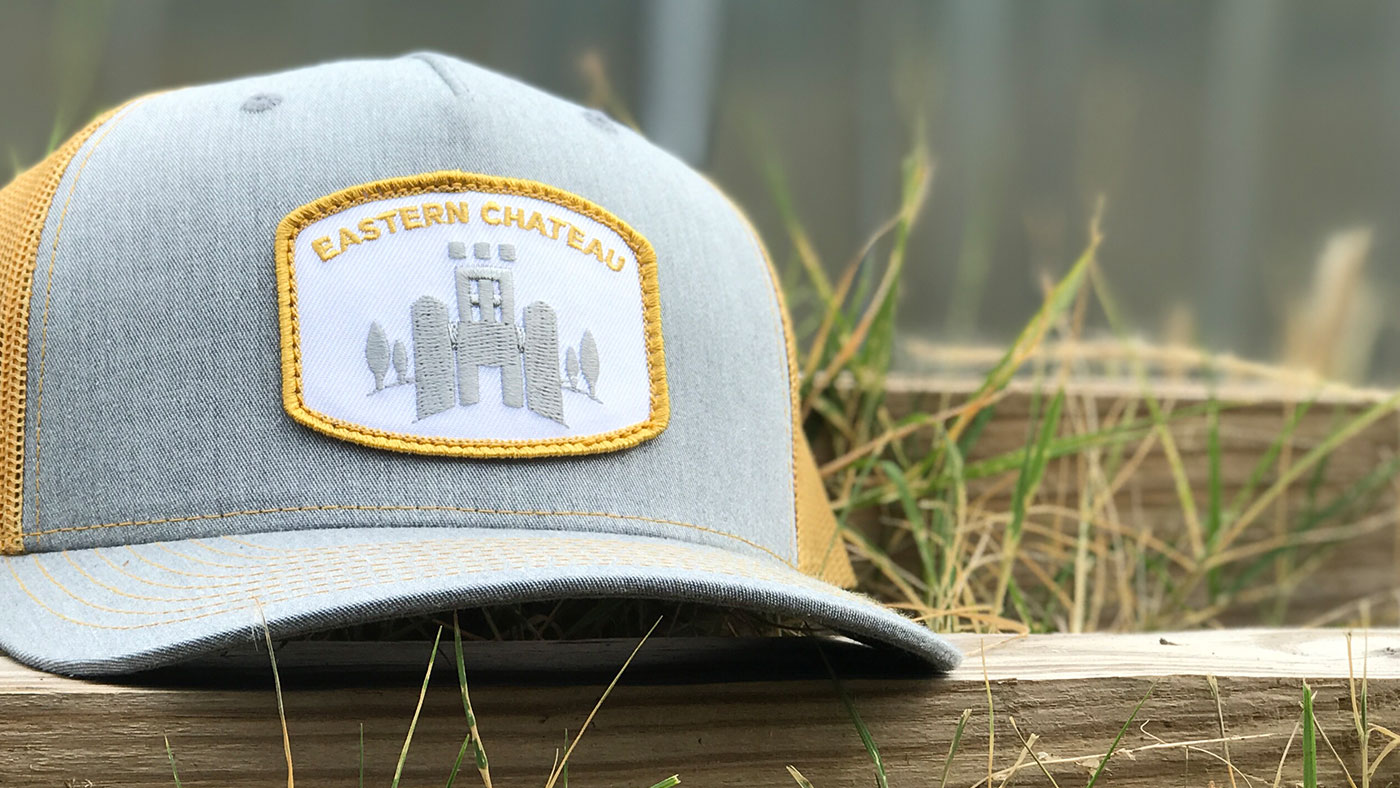 Custom Richardson 5 Panel Trucker Hats Custom construction company Richardson on a field