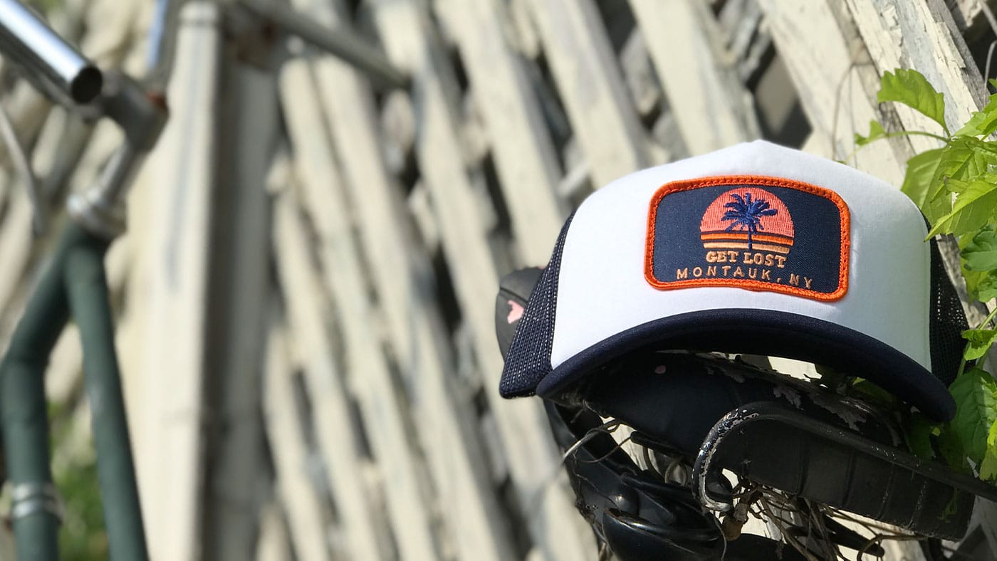 Foam Trucker Hat With Custom Patch Hat Colorful Montauk NY patch on a Black and White hat