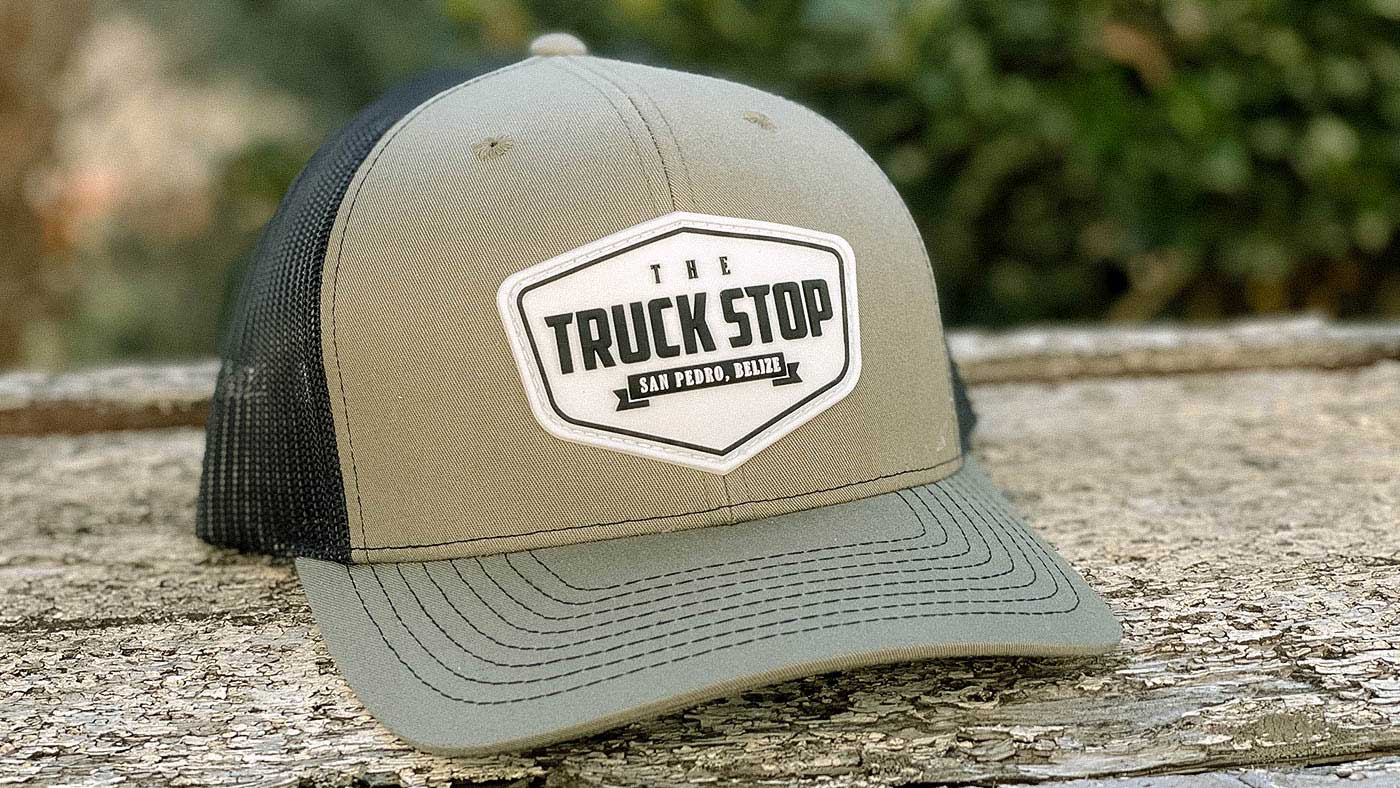 Loden green hat with a rubber Truck Stop patch