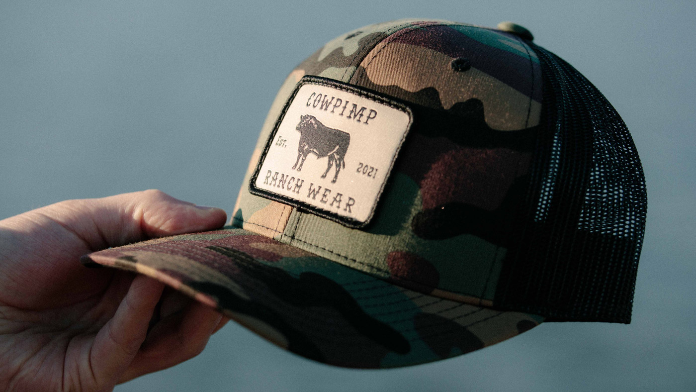 camo trucker hat with woven patch