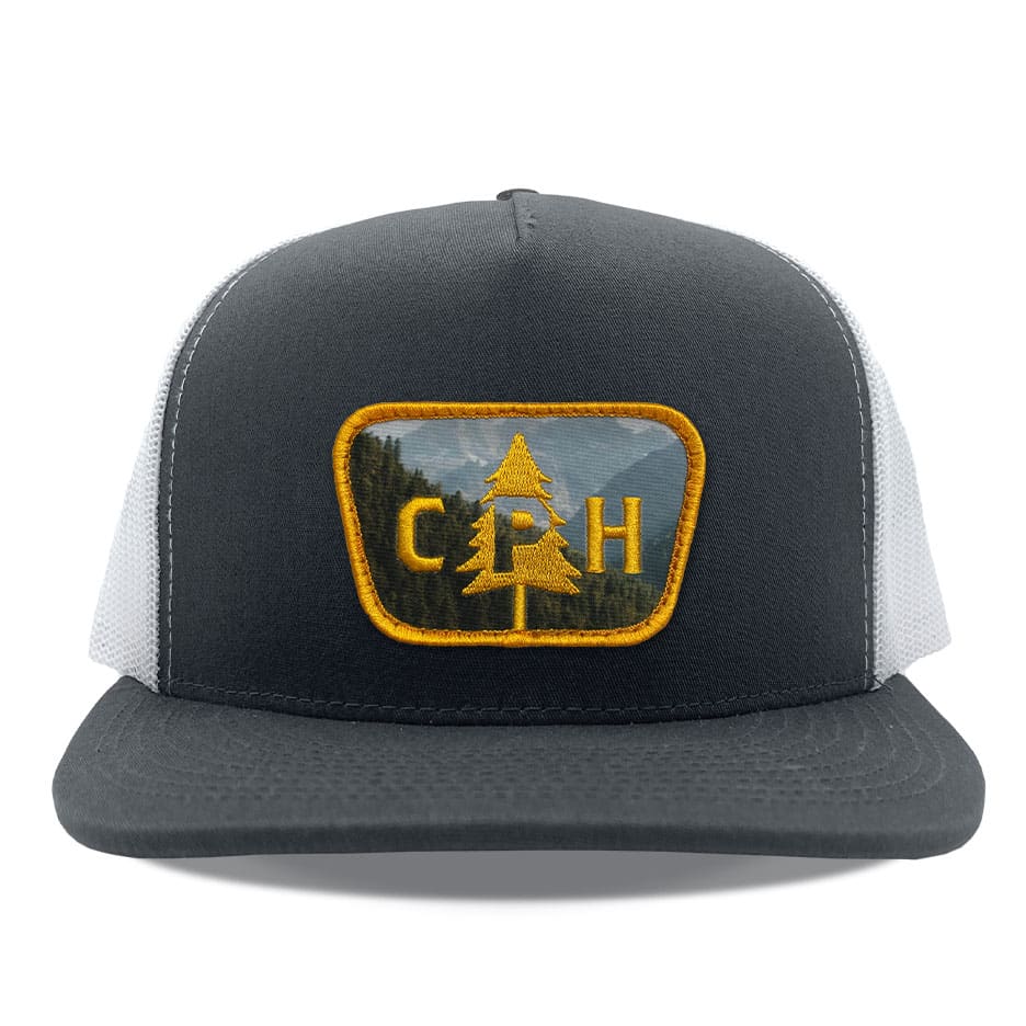 Yupoong 6606 charcoal/black, mid-profile trucker, snapback closure.Hat