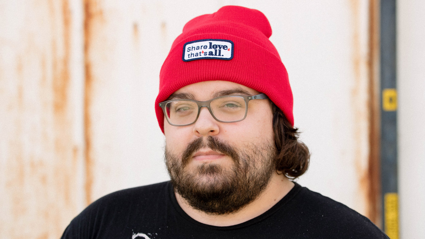 man wearing red beanie 