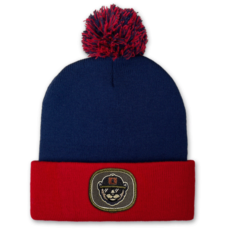 Sportsman 12-inch pom beanie with embroidered patch logo.