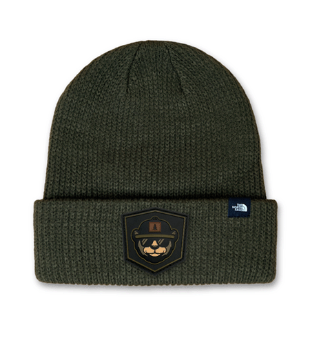 The North Face truckstop beanie with PVC rubber patch branding.