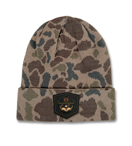 Richardson camo beanie with PVC rubber patch branding.
