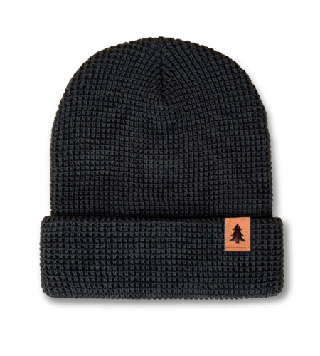 Richardson knit waffle beanie with suede clip label branding.