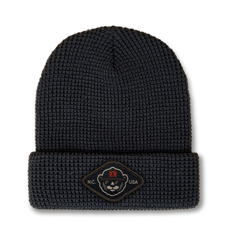 Richardson waffle knit beanie with woven patch logo, custom cuffed style.