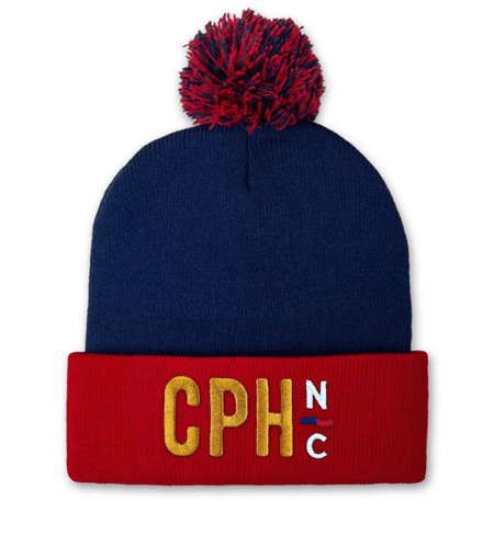 Custom pom-pom cuffed beanie with direct embroidery logo.