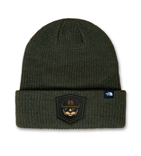 The North Face truckstop beanie with PVC rubber patch branding.