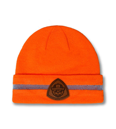 Custom reflective CornerStone beanie with leather patch branding.