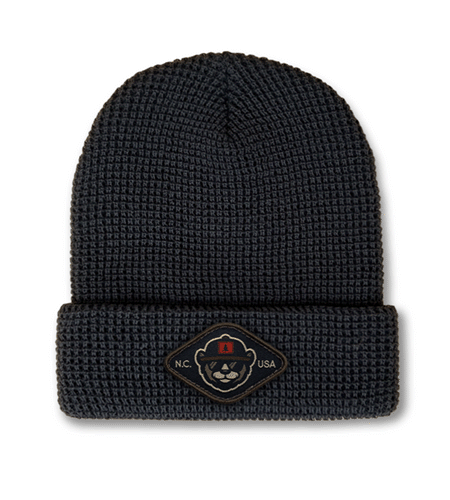 Richardson waffle knit beanie with woven patch logo, custom cuffed style.